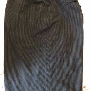 Michael Kor’s pinstriped black trousers